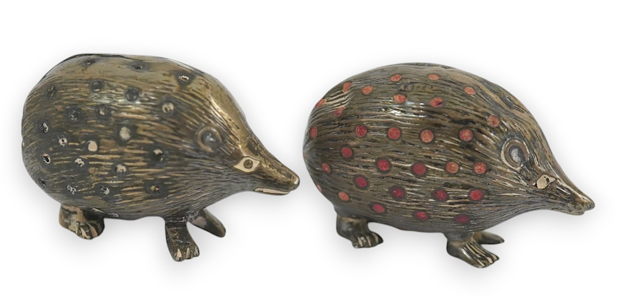 Two Edwardian silver novelty pin cushions, modelled as porcupines